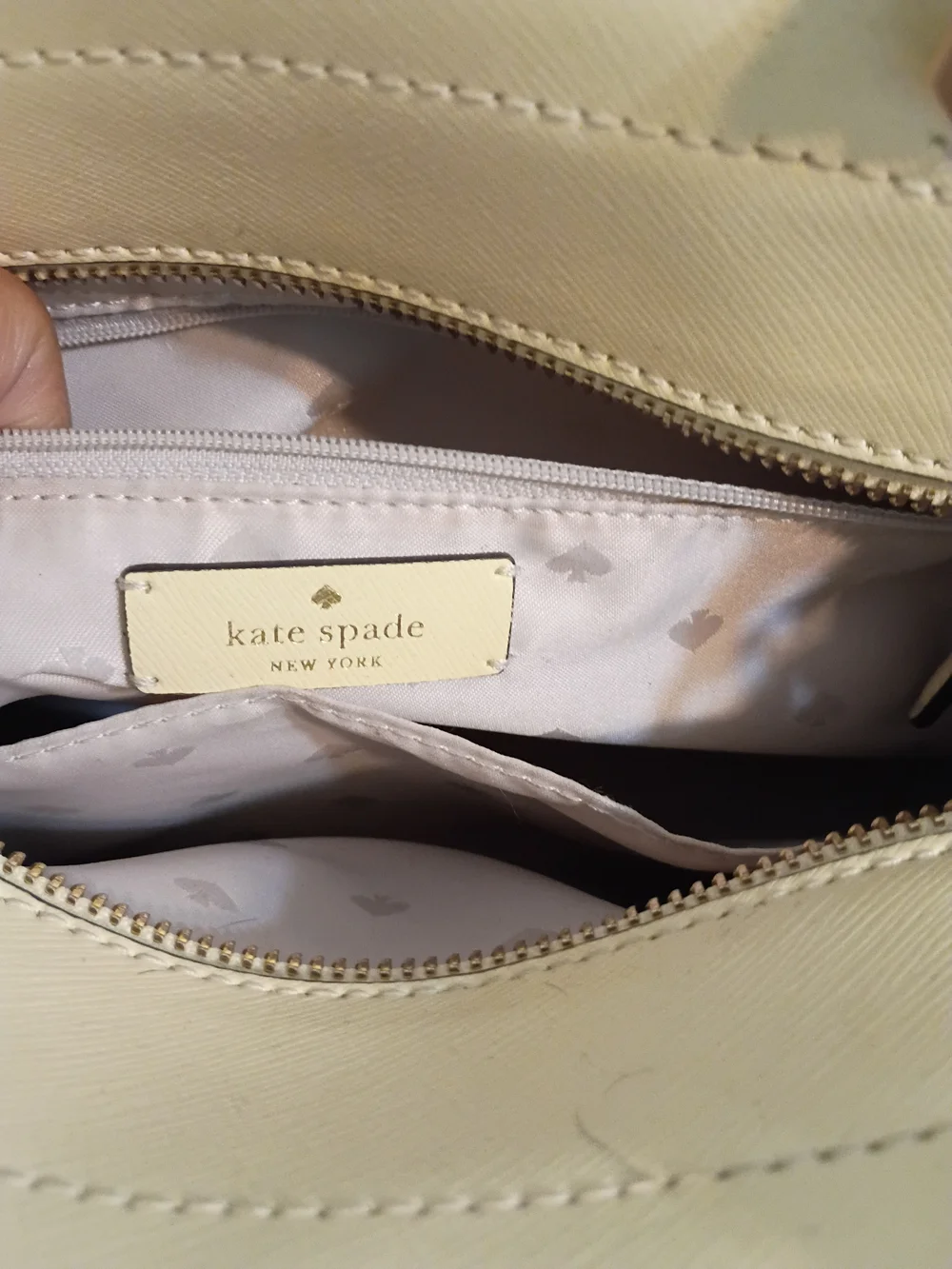 Kate Spade Staci Medium Satchel in a light yellow colorway.
